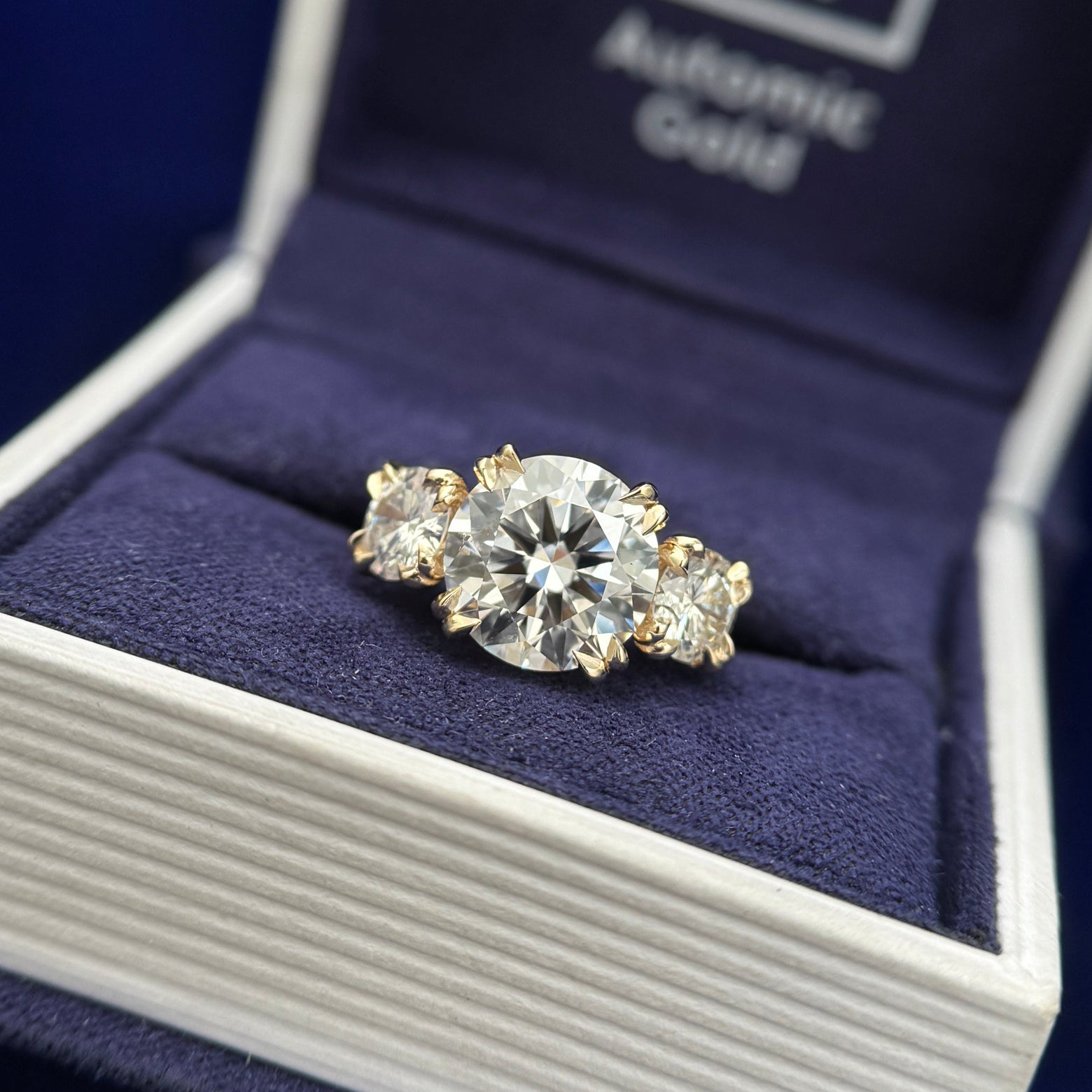 14 yellow gold 4ctw 3ct center and 5mm side diamonds trilogy custom ring