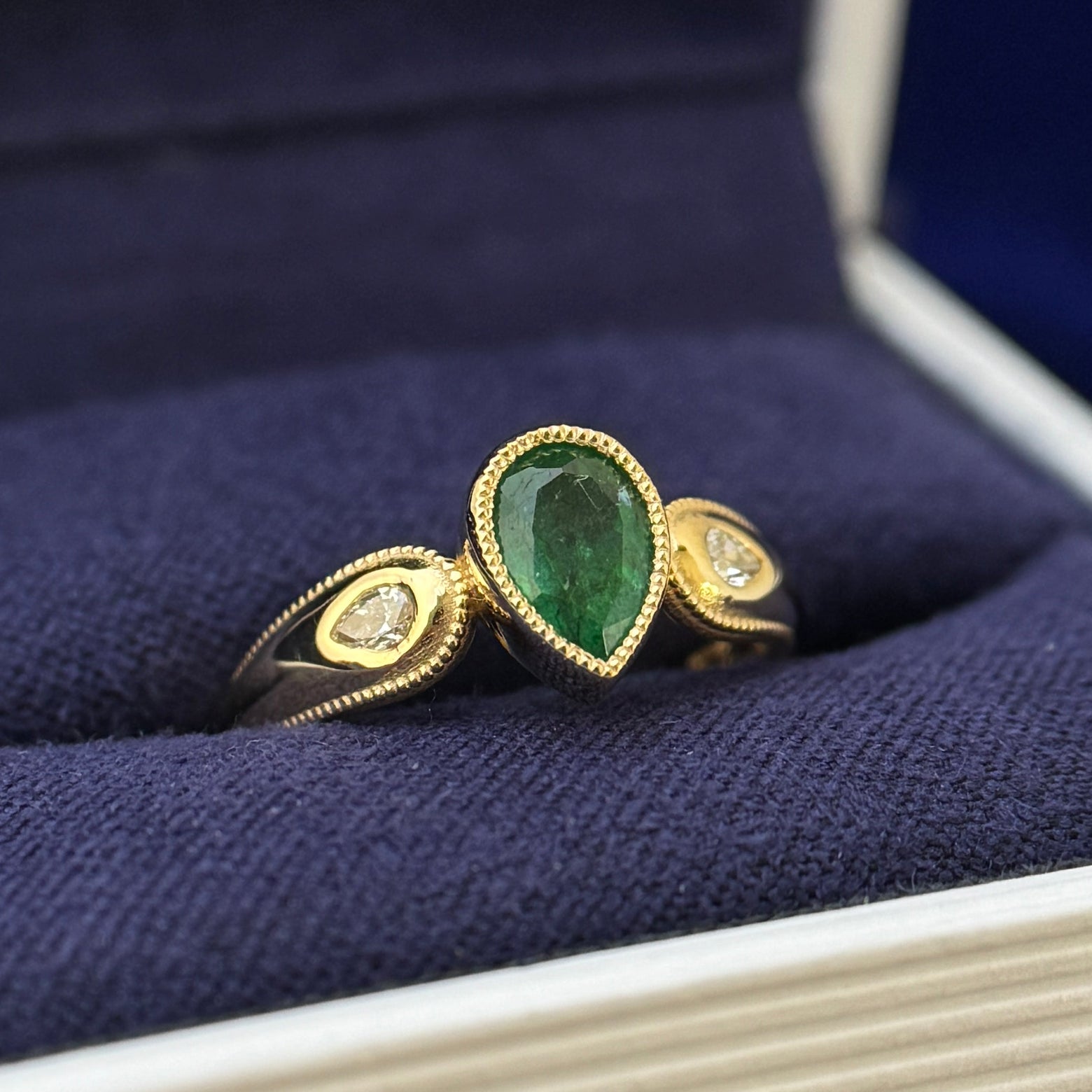 22k Yellow Gold and Milgrain-bezel-set 1.08ct Natural Emerald Custom-cut into 5x7.1mm Pear with 2pc 3x2mm Lab Diamonds Flush-set on Milgrain Tapered Band Custom Ring, 5 grams, size 4.75