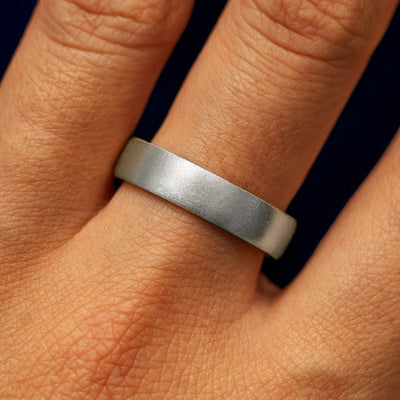 Close up view of a model's fingers wearing a Silver Mix Matte Band