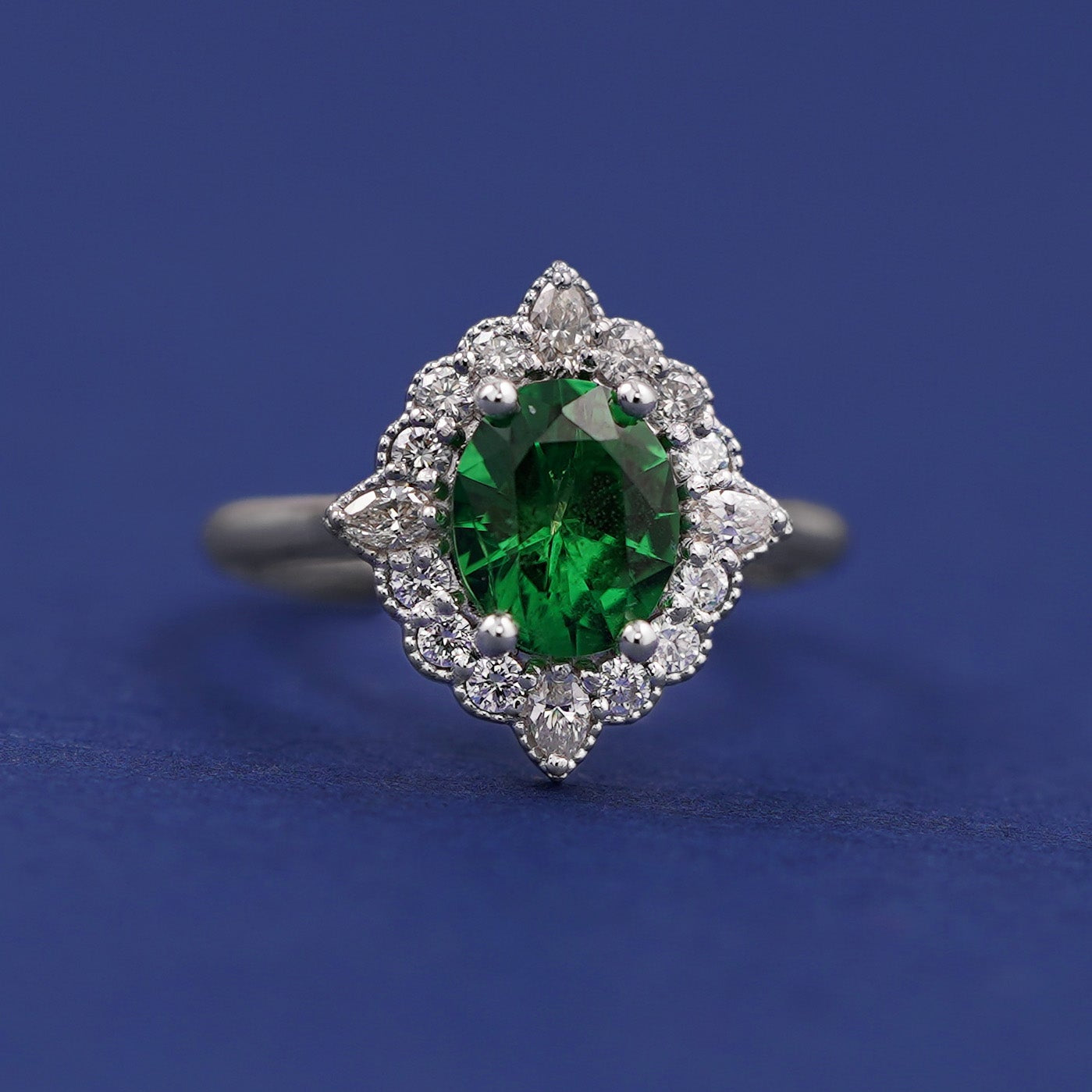 950 Platinum and Oval Tssavorite with Halo of Round and Pear Diamonds Custom Ring