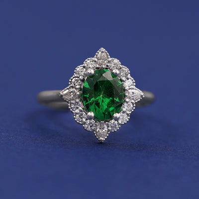 950 Platinum and Oval Tssavorite with Halo of Round and Pear Diamonds Custom Ring