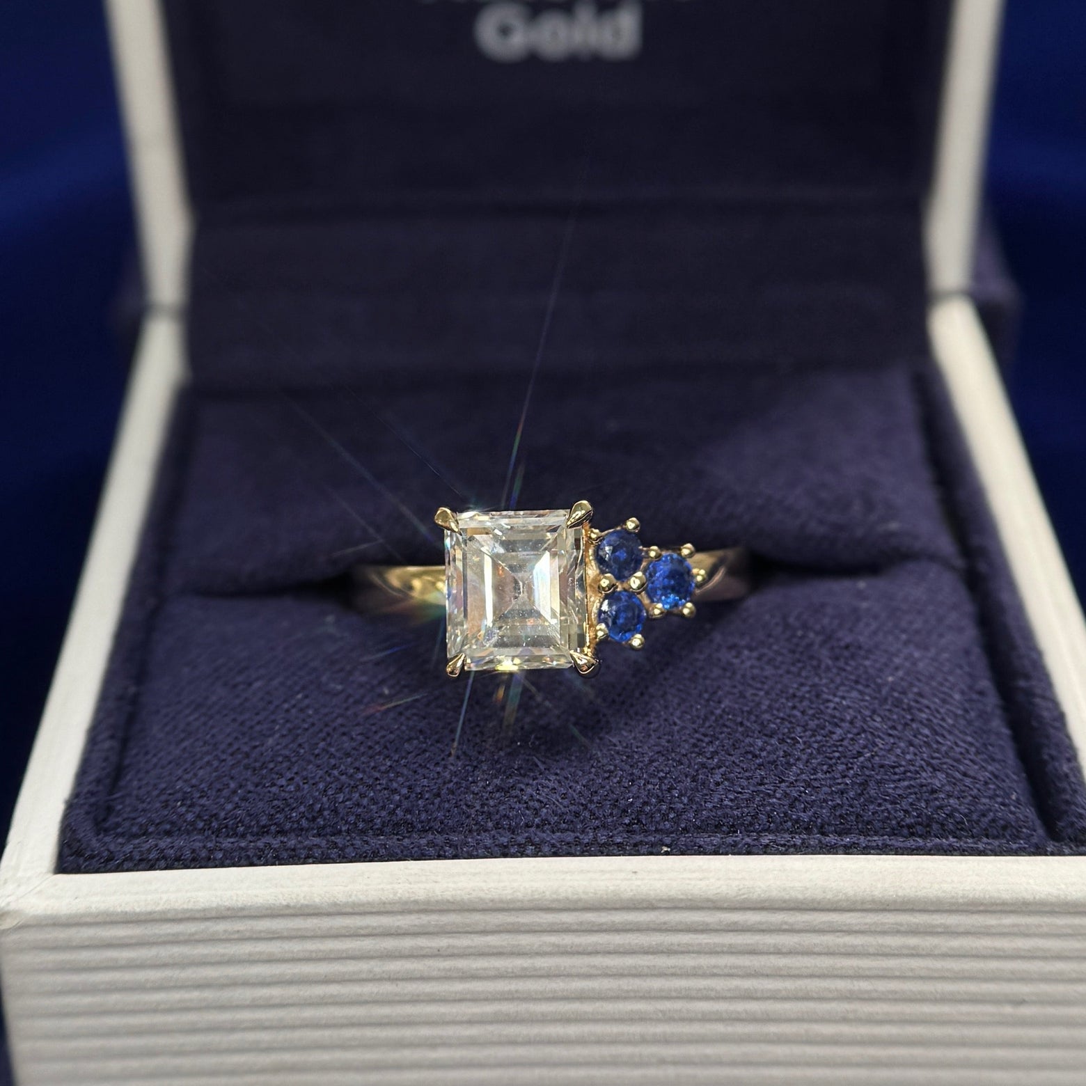 Customers 6.3g of 14k Yellow Gold and Customers 1.94ct Asscher Diamond with 4pc Gems off-set Cluster on 2.5mm Mix Mirror Band Custom Ring, size 7.5
