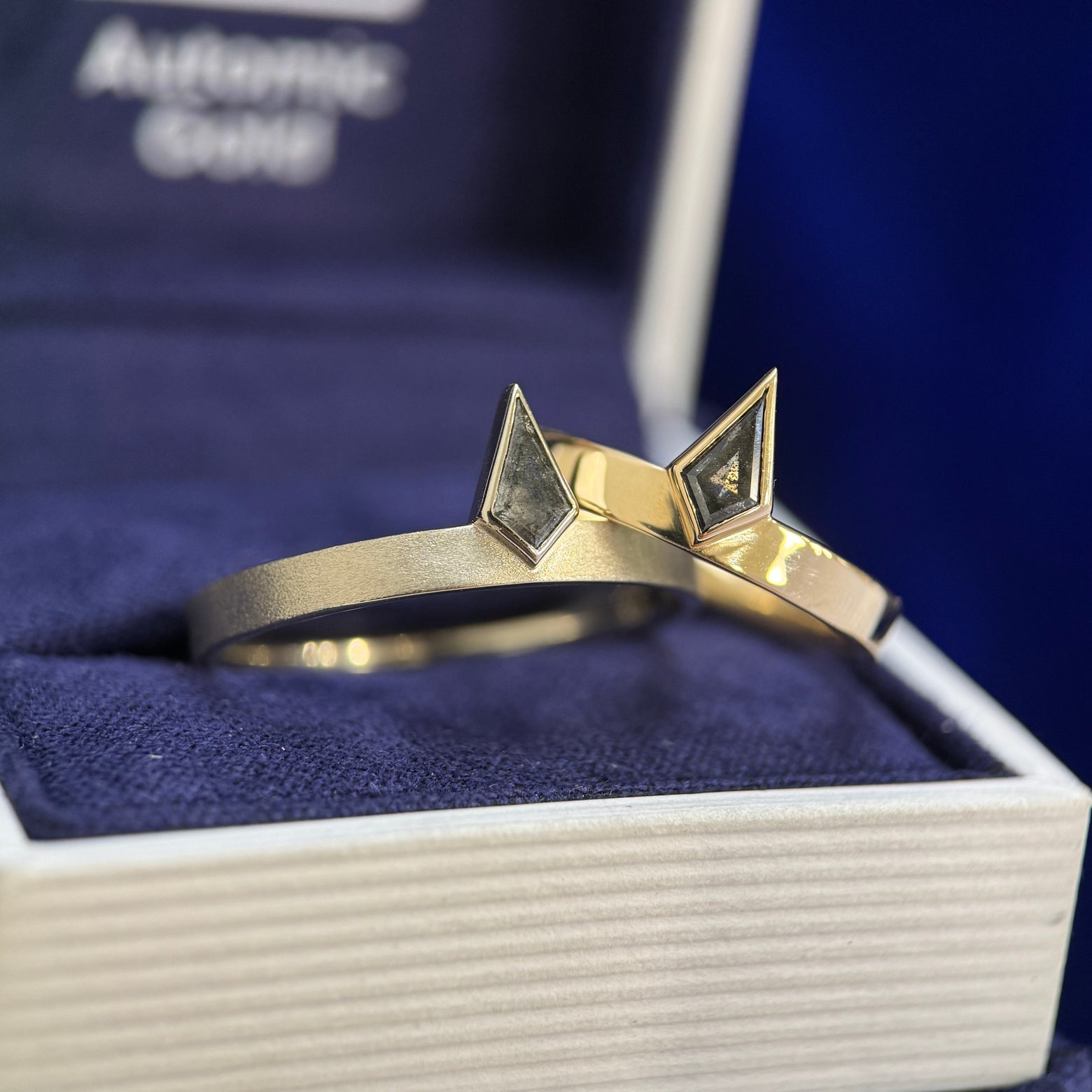14k Champagne Gold and Bezel-set 0.41ct Kite Salt-and-pepper Diamond on 3mm Industrial Mirror Band Custom Ring and 14k Champagne Gold and Bezel-set 0.35ct Kite Salt-and-pepper Diamond on 3mm Industrial Stardust Band Custom Ring, size 7.5 and size 11.5