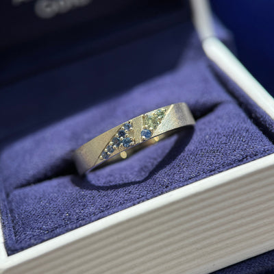 14k Nickel-free Champagne Gold and Triangle-set 9pc Green, Teal, Blue Sapphires on 4mm Industrial Stardust Band Custom Ring, size 7.5 