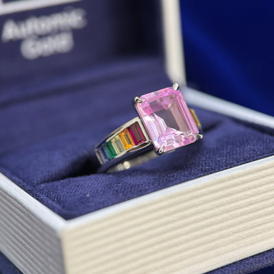 950 Platinum and 10x8mm Emerald-cut Pink Lab Sapphire and Channel set 2x4mm Baguette Rainbow Lab Sapphires Half-way around the Band Custom Ring, size 6.5
