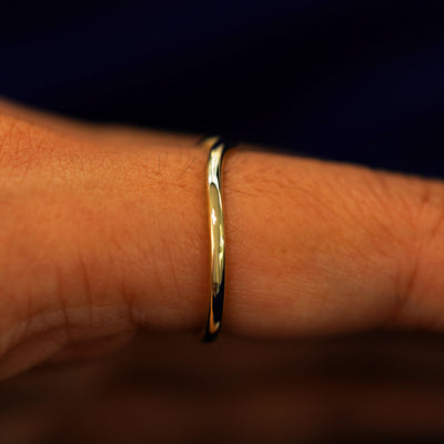 Side view of a Chevron Band on a model's finger to show details