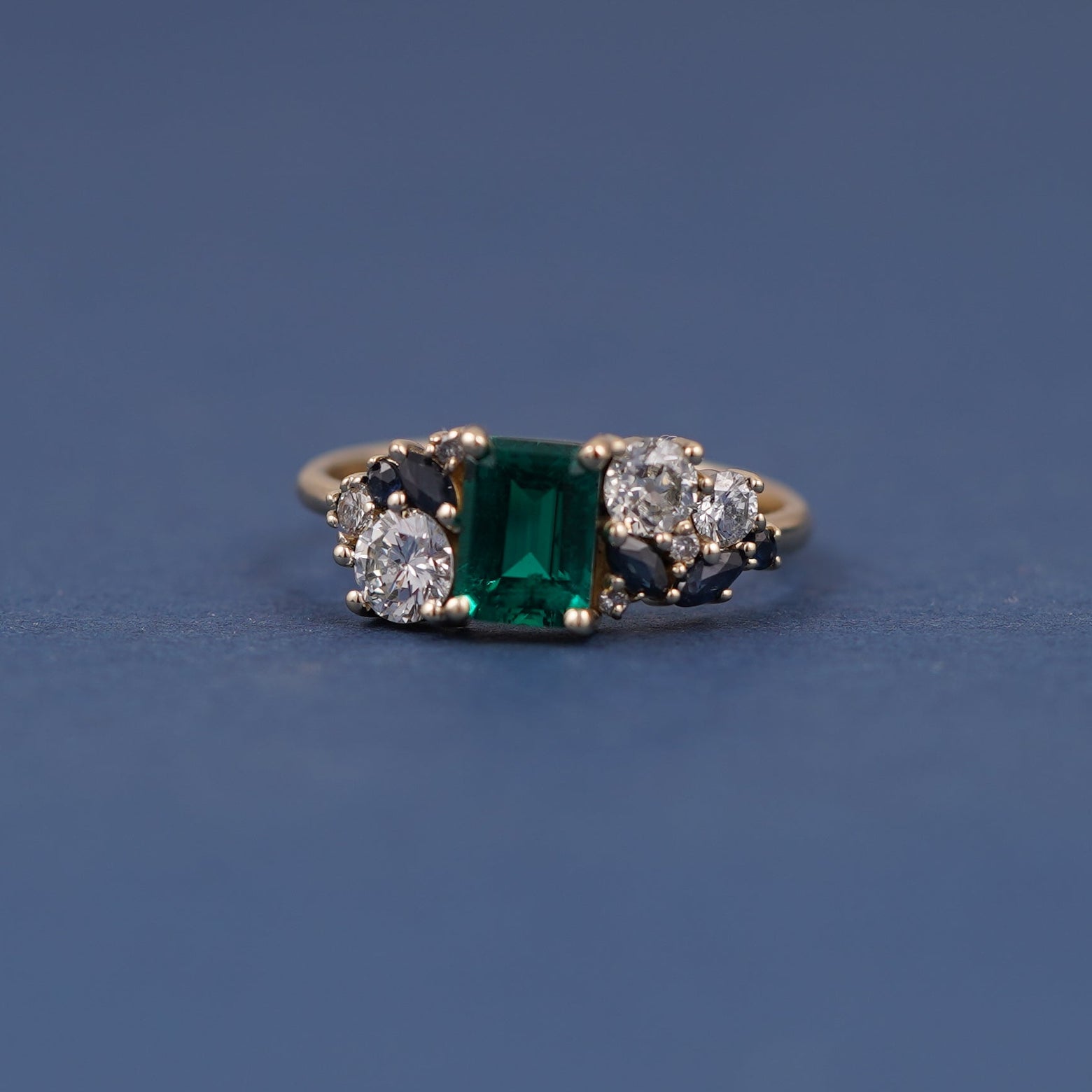 14k Yellow Gold and Emerald-cut Lab Emerald with Cluster of Sapphires and Diamonds Custom Ring