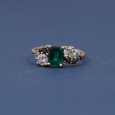 14k Yellow Gold and Emerald-cut Lab Emerald with Cluster of Sapphires and Diamonds Custom Ring