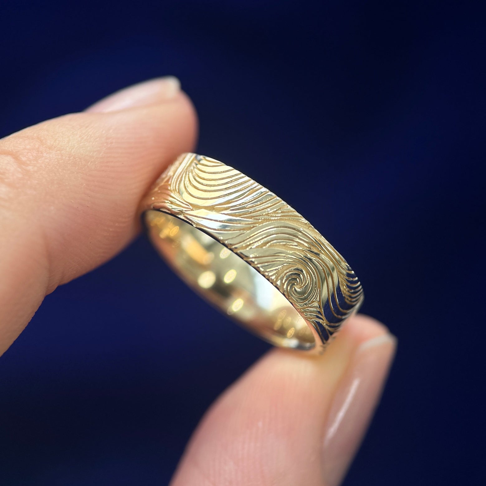 front view of 14k Yellow Gold Unique Non-repeating Waves Engraved Outside and Whale Engraved on the inside of 6mm Industrial Comfort-fit Band Custom Ring, size 7