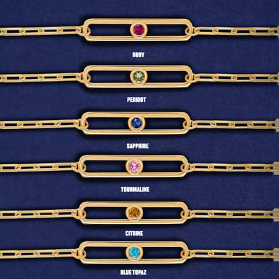 Six one-stone Dancing Gemstone necklaces showing options of Ruby, Peridot, Sapphire, Pink Tourmaline, Citrine, and Blue Topaz