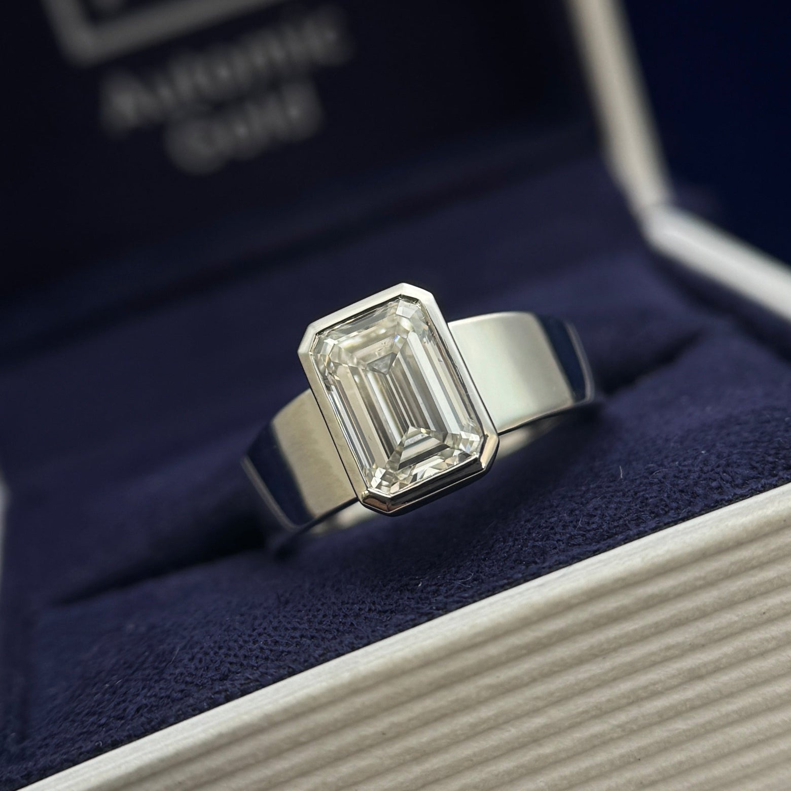 950 Platinum Bezel-set 2ct Emerald-cut Lab Diamond on 6-2mm Tapered Band Custom Ring, Size 4.75