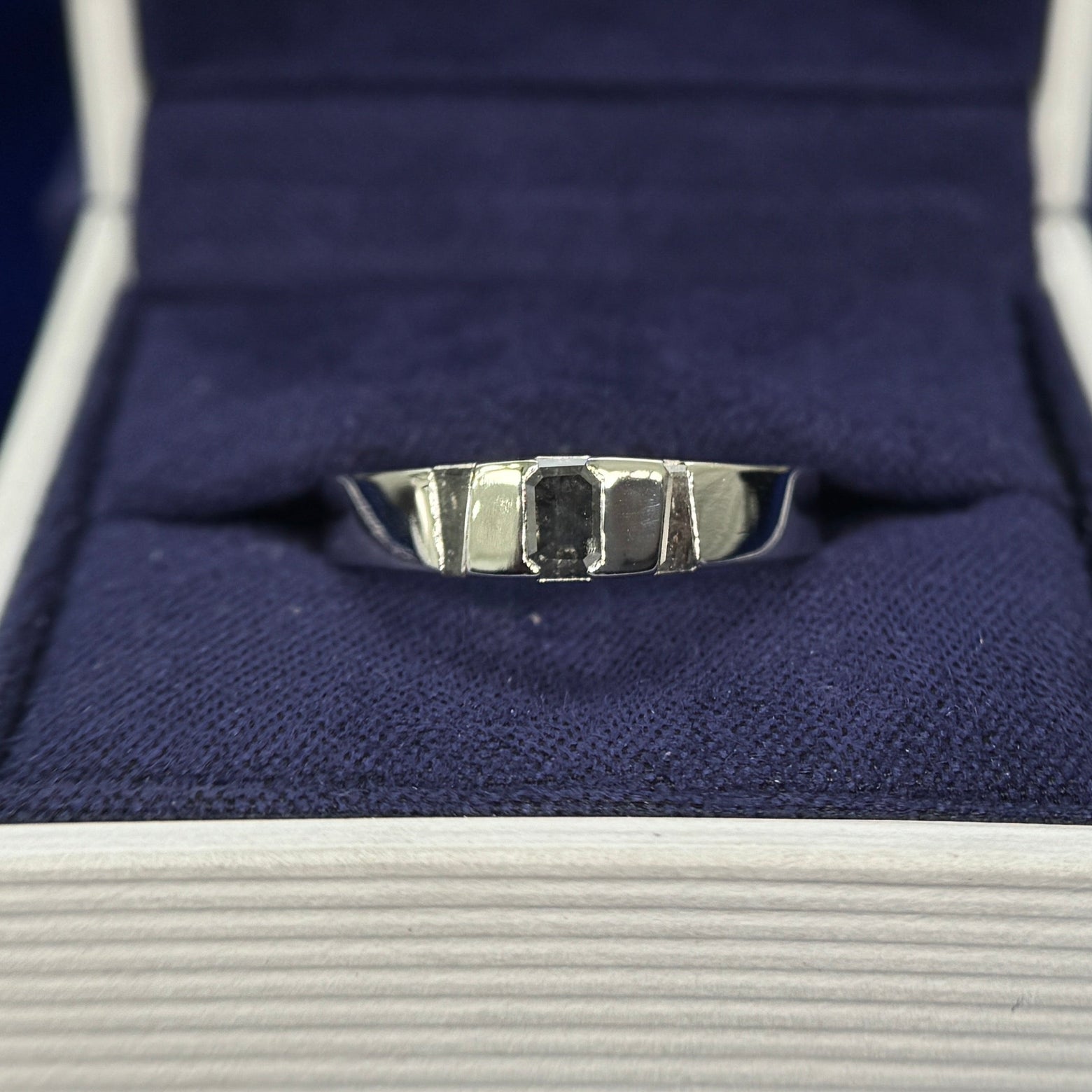 950 Platinum and Tension-set 0.42ct 4.5x3.3mm Emerald-cut Salt-and-pepper Diamond with 2pc Tapered Baguettes Salt-and-pepper Diamonds on 4.5mm Industrial Mirror Band Custom Ring, size 7.5