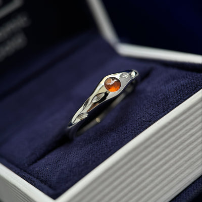 4k White Gold and Flush-set 4mm Round Spessartine with Two Engraved Leaves 5-1.7mm Tapered Band Custom Ring, size 7.75