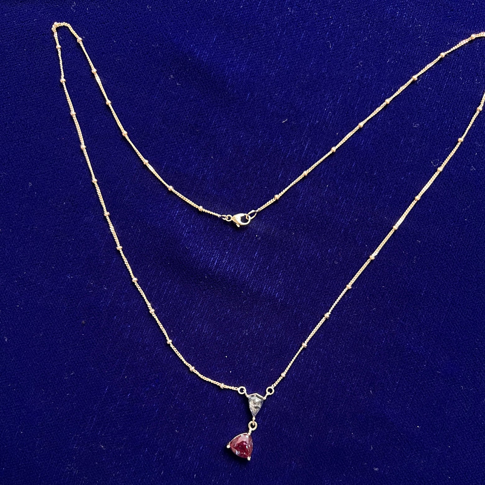 full view of 14k Yellow Gold 1.60ct Trillion Lab Alexandrite and 0.65ct Shield Salt-and-pepper Diamond set on 18" Beaded Chain