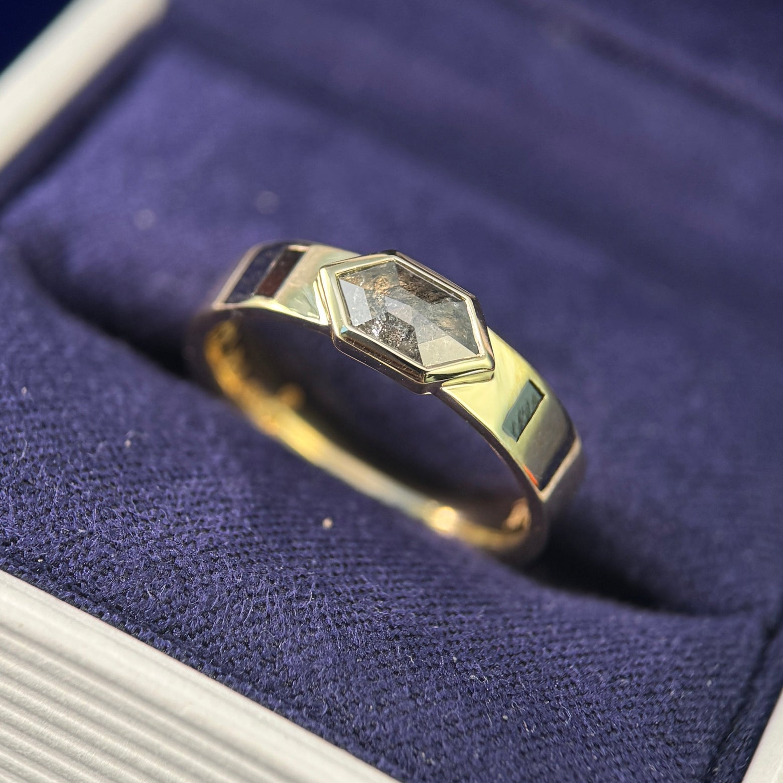 14k Yellow Gold and Bezel-horizontal-set 0.50ct Hexagon Salt-and-pepper Diamond with 2pc Flash-set 3x1.5mm Salt and Pepper Baguettes on 4mm Industrial Mirror Band 