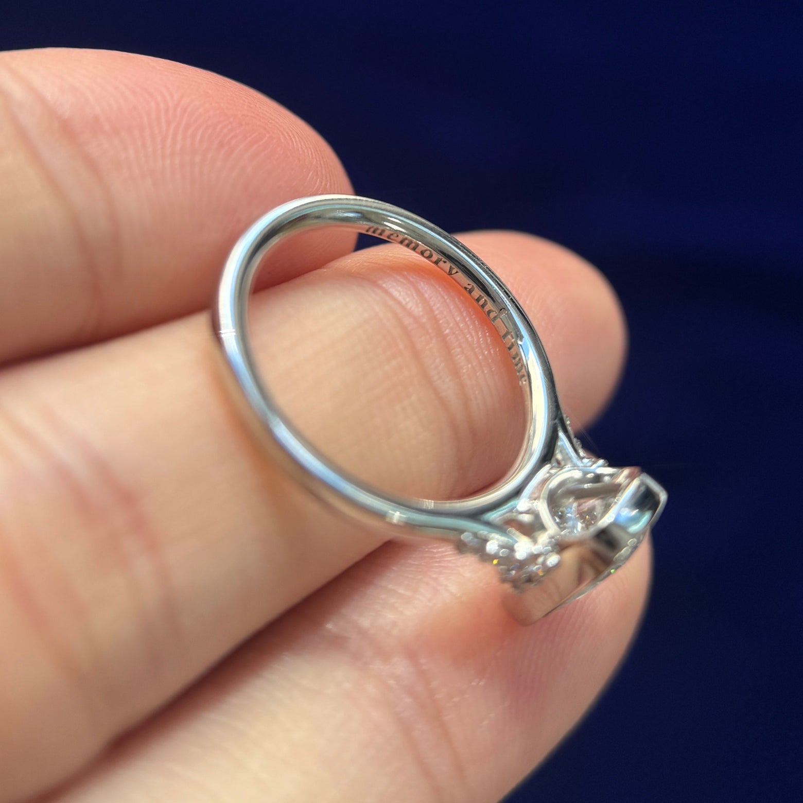 hidden engraving of video of 950 Platinum & Bezel-High-Cathedral-set 1.5ct Elongated Cushion Lab Diamond with Cluster of Small Lab Diamonds on Thin Band Custom Ring, size 5