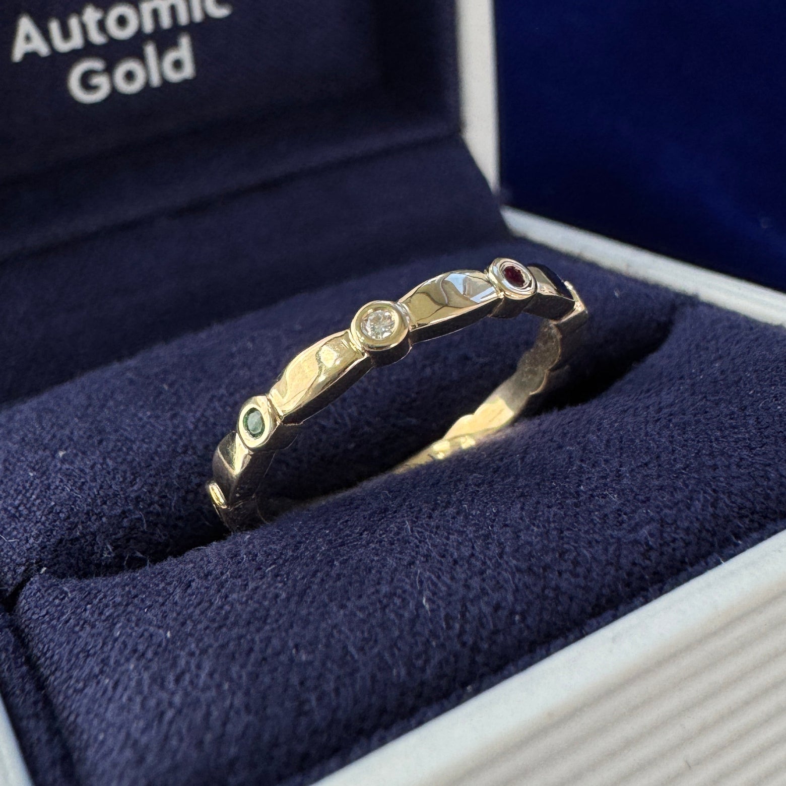 14k Yellow Gold and 9pc Lab Ruby, Lab Emerald, Moissanite Bezel set on Custom Wedding Band, Size 6