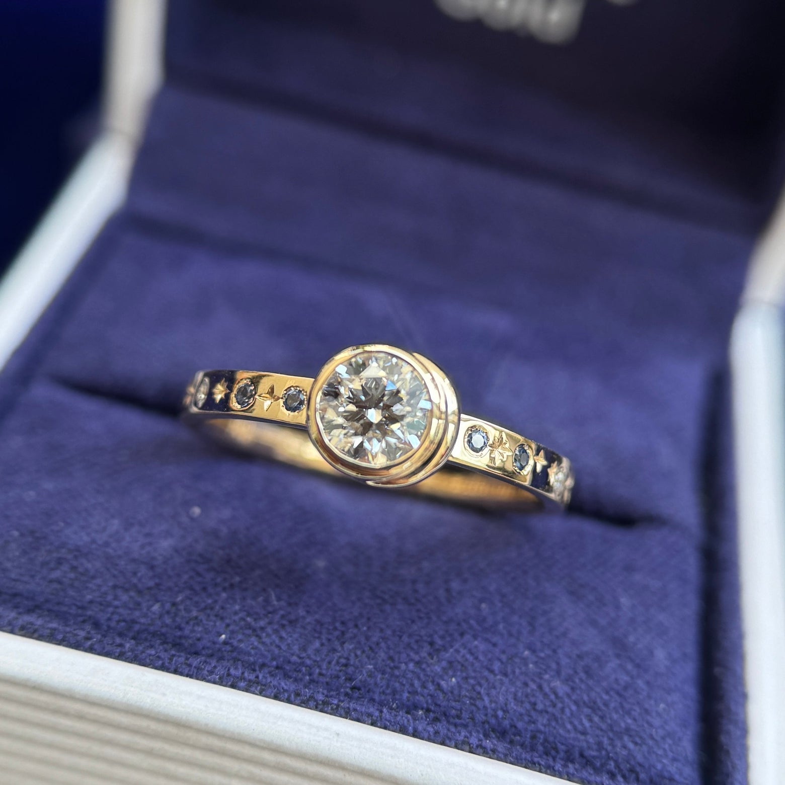 14k Yellow Gold and 5.5mm Round Lab Diamond with Cresent Moon and 4pc Small Round Light Blue Diamonds and Stars Engraved on 2.5mm Industrial Mirror Band Custom Ring, size 8.5