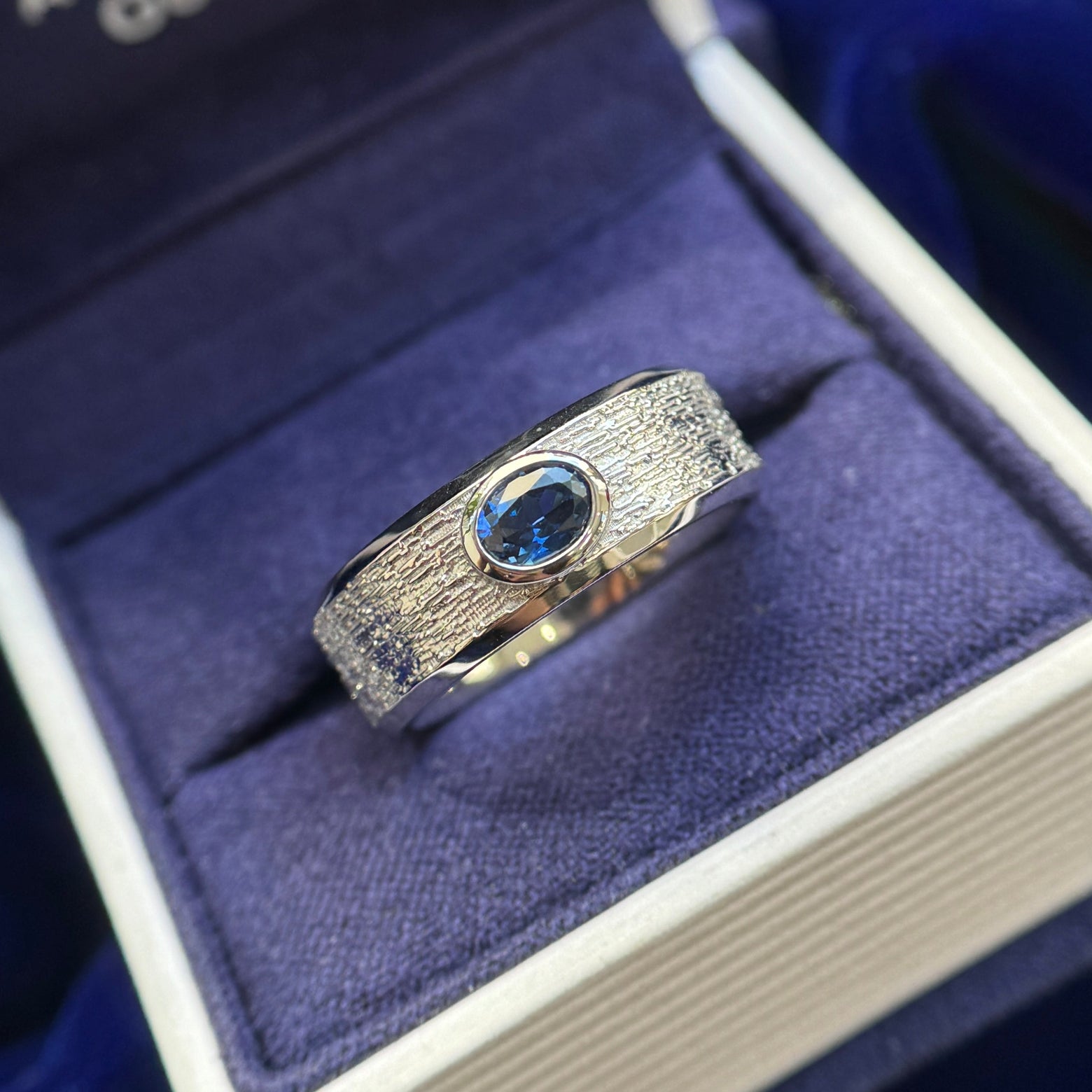 950 Platinum and Bezel-set 4x5.6mm Oval Sapphire on 7mm Beveled Edge Band Custom Ring, size 7.75
