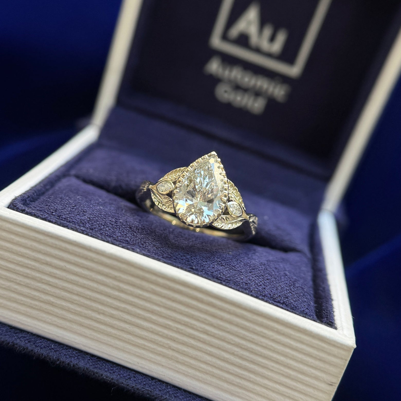 14k Champagne Gold and Low-etched-bezel-set 1.5ct Pear Lab Diamond with Marquise Lab Diamonds on Open Leaves Band Custom Ring, size 5.25