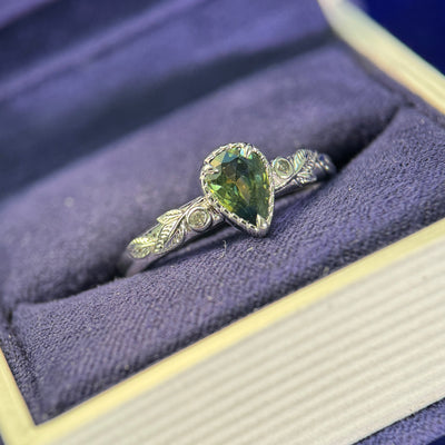 14k White Gold Scalloped-set 0.85ct Pear Dark Green Sapphire and 2pc Salt and Pepper Diamonds Small Leaves Half Around Band Custom Ring, engraved "Forever basking in your glow", 4 grams, Size 8.75