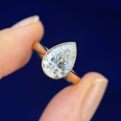 14k Yellow Gold and Petal-set 3ct 12x8mm Pear Moissanite on Tapered Band Custom Ring, size 7