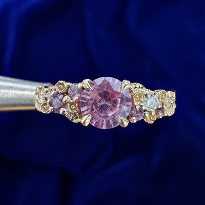 14k Yellow Gold 5mm Round Pink-Purple Natural Sapphire with Small Round Pink Sapphires and White Diamonds on Leaves Design Band Custom Engagement Ring, size 4.75