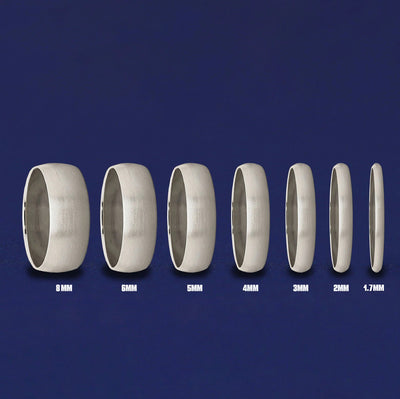 Seven versions of the Platinum Curvy Matte Band showing the different thickness options of the ring from 8mm to 1.7mm