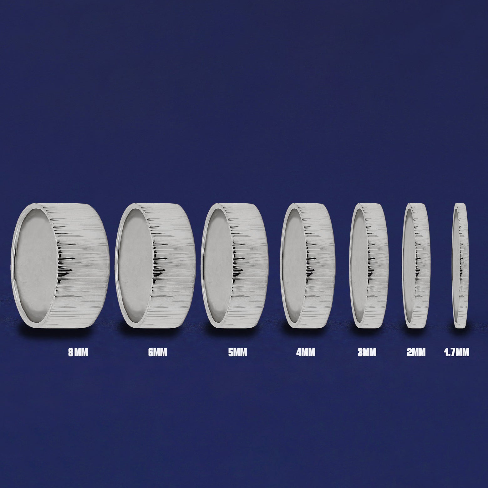 Seven versions of the Platinum Industrial Wood Band showing the different thickness options of the ring from 8mm to 1.7mm