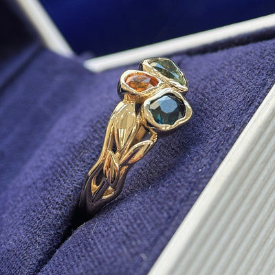 side view of 14k Yellow Gold and Melted-bezel 1.20ct Nature colors Sapphires 3-stone on Polished Leaves and Branches Band Custom Ring, size 6.25