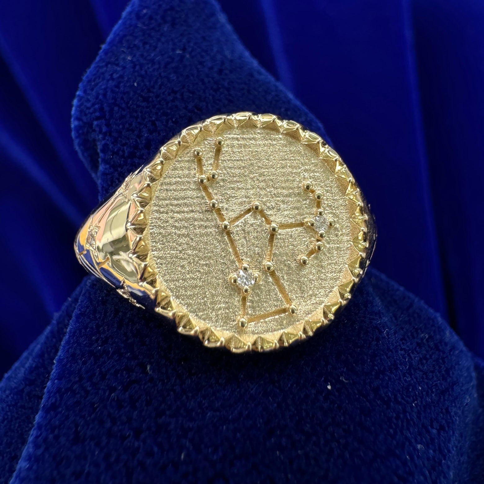side view of signet zodiac ring