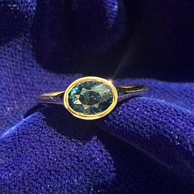 14k White Gold and 1.64ct Oval Blue/Teal Sapphire Horizontally Bezel Set Slim Signet Style Custom Engagement Ring, size 5.25