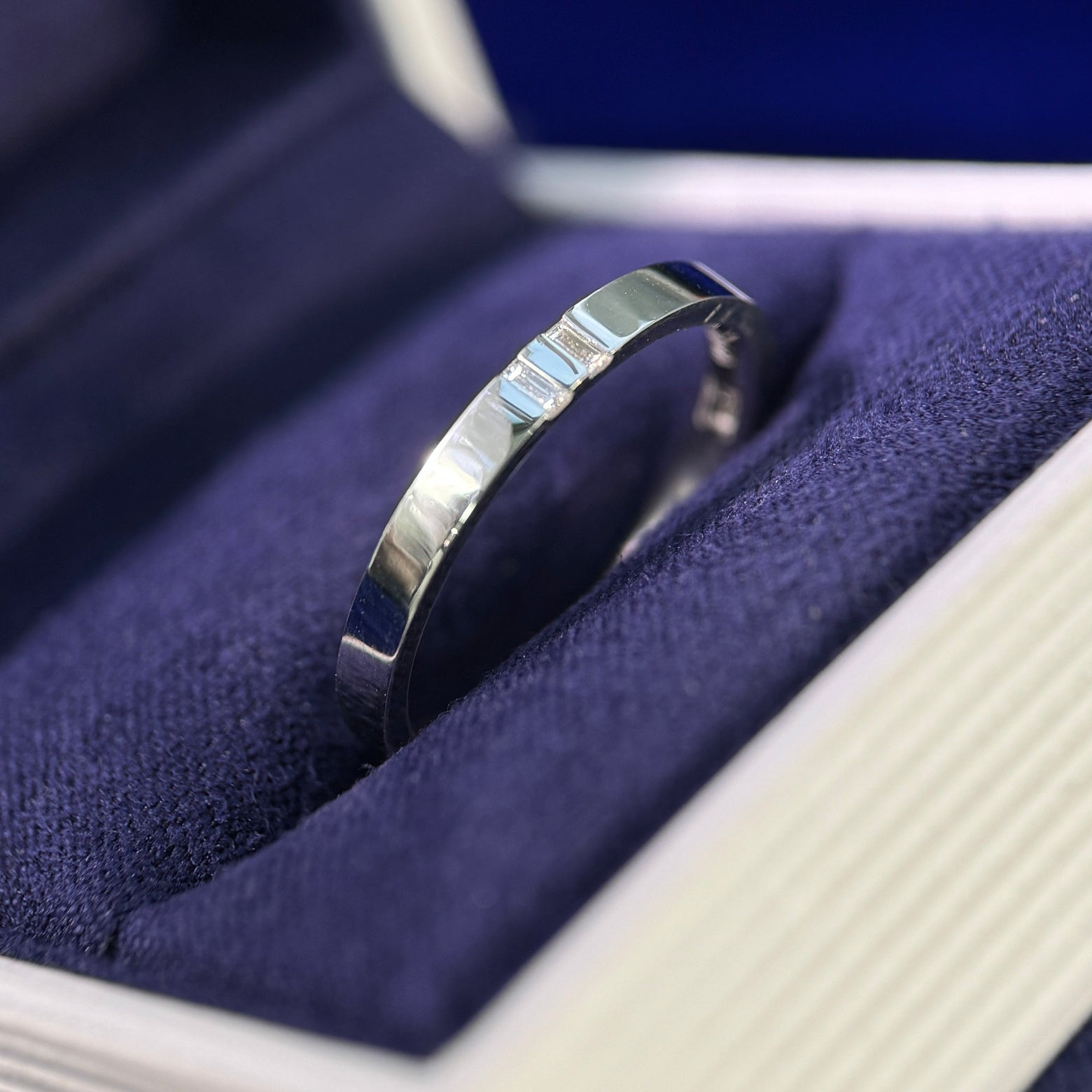 950 Platinum and Tension-set Customers 2pc 2.3mm Baguette Diamonds on 2.3mm Industrial Mirror Custom Band, size 7
