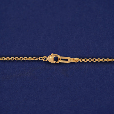 Close up view of a clasped AU lobster claw clasp on a Bound Together Bracelet