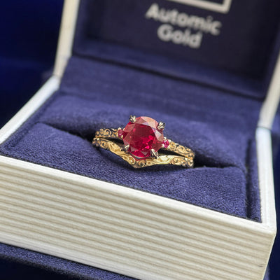 14k Yellow Gold and Vintage Prong-low-set 7mm Round Lab Ruby with 2 Small Lab Rubies on Filigree Band Custom Ring with Chevron Filigree Band, both in size 5.25