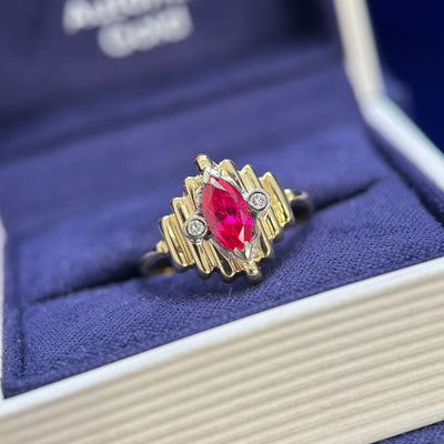 Remake white gold part of the ring, add center 7x3.5mm lab ruby with lab diamonds on the sides