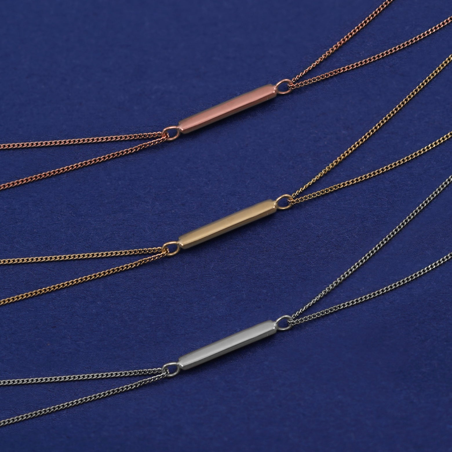 Three Bar Bracelets shown in options of rose, yellow, and white gold