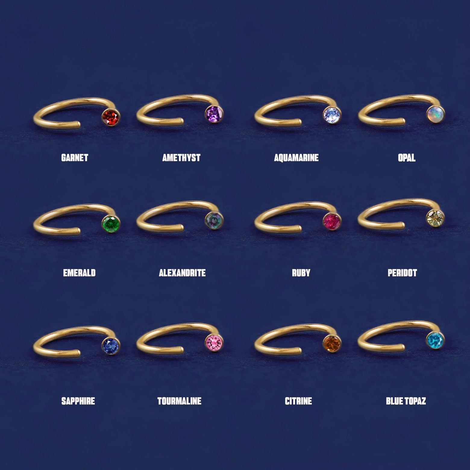 Twelve versions of the solid gold Gemstone Open Hoop showing the different stone options
