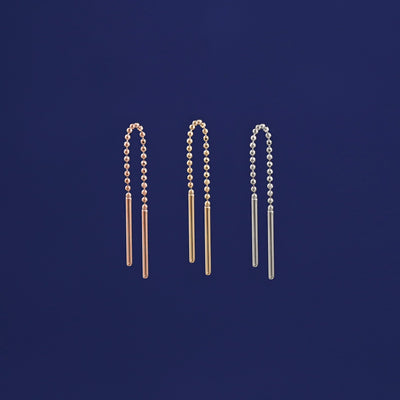 Three versions of the Mini Threader shown in options of rose, yellow, and white gold